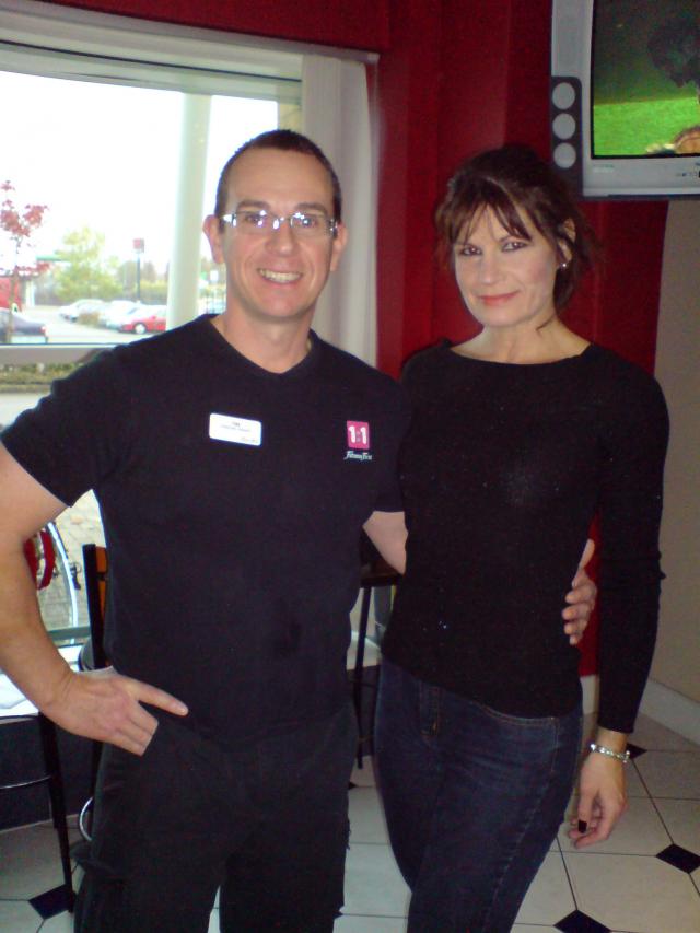 image shows: Personal Trainer Tim Sharp With a client a 43 year old mum has lost 4 stone so far with my diet and training