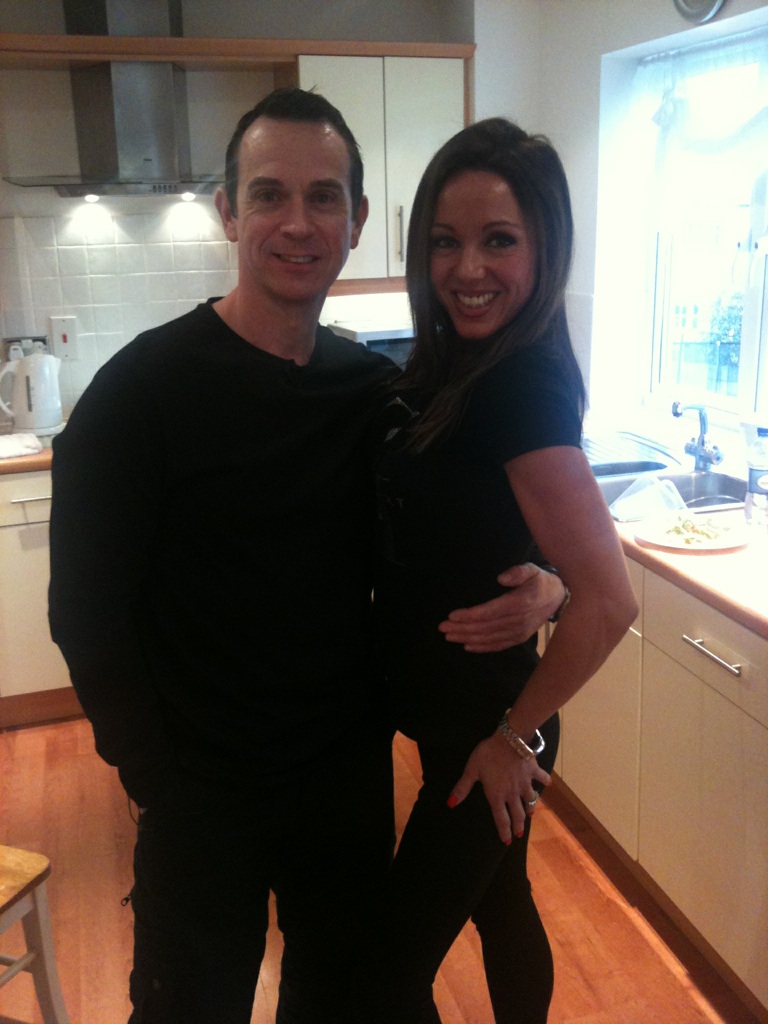 An image of Personal Trainer Tim Sharp with Rachel filming at Timâ€™s house goes here.